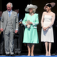 Prince Charles; Camilla, Duchess of Cornwall; and Meghan, Duchess of Sussex, attend Charles’ 70th-birthday celebration at Buckingham Palace on May 22, 2018 in London.